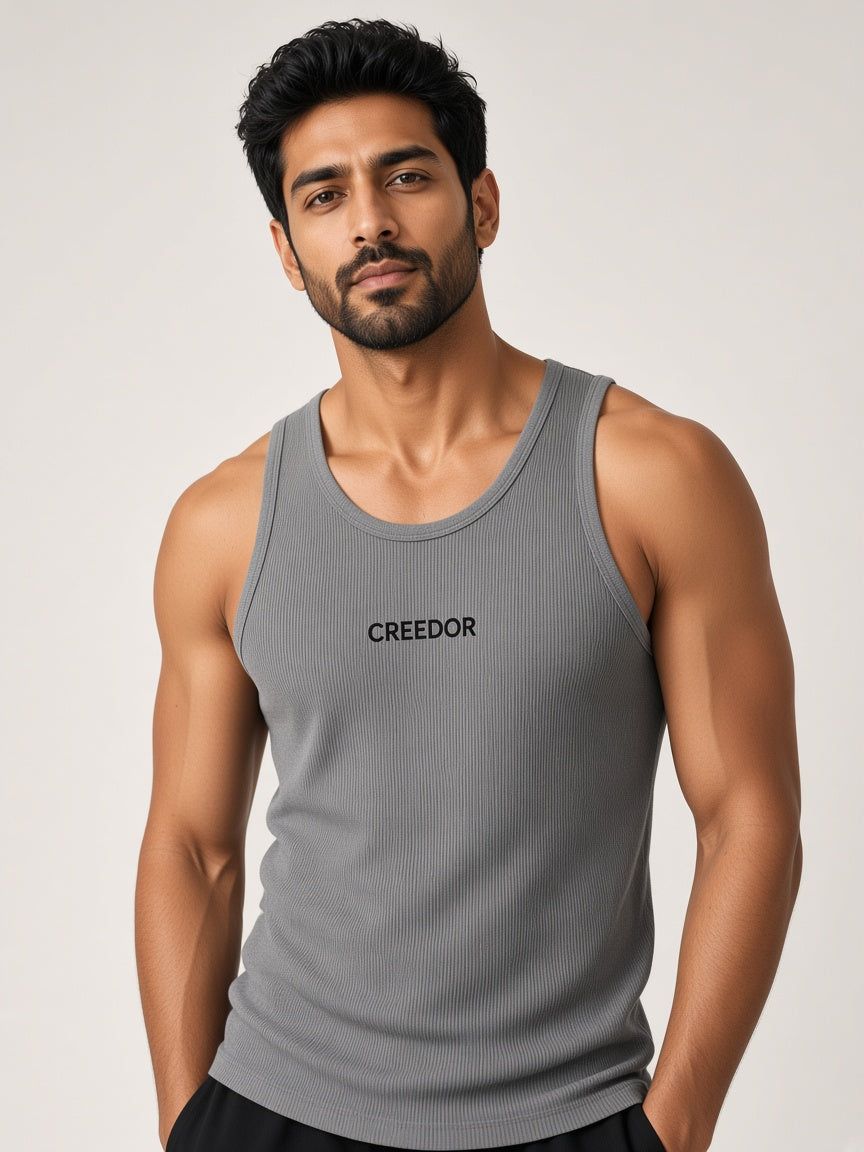 Model wearing the CREEDOR men's vest in grey (concept render)